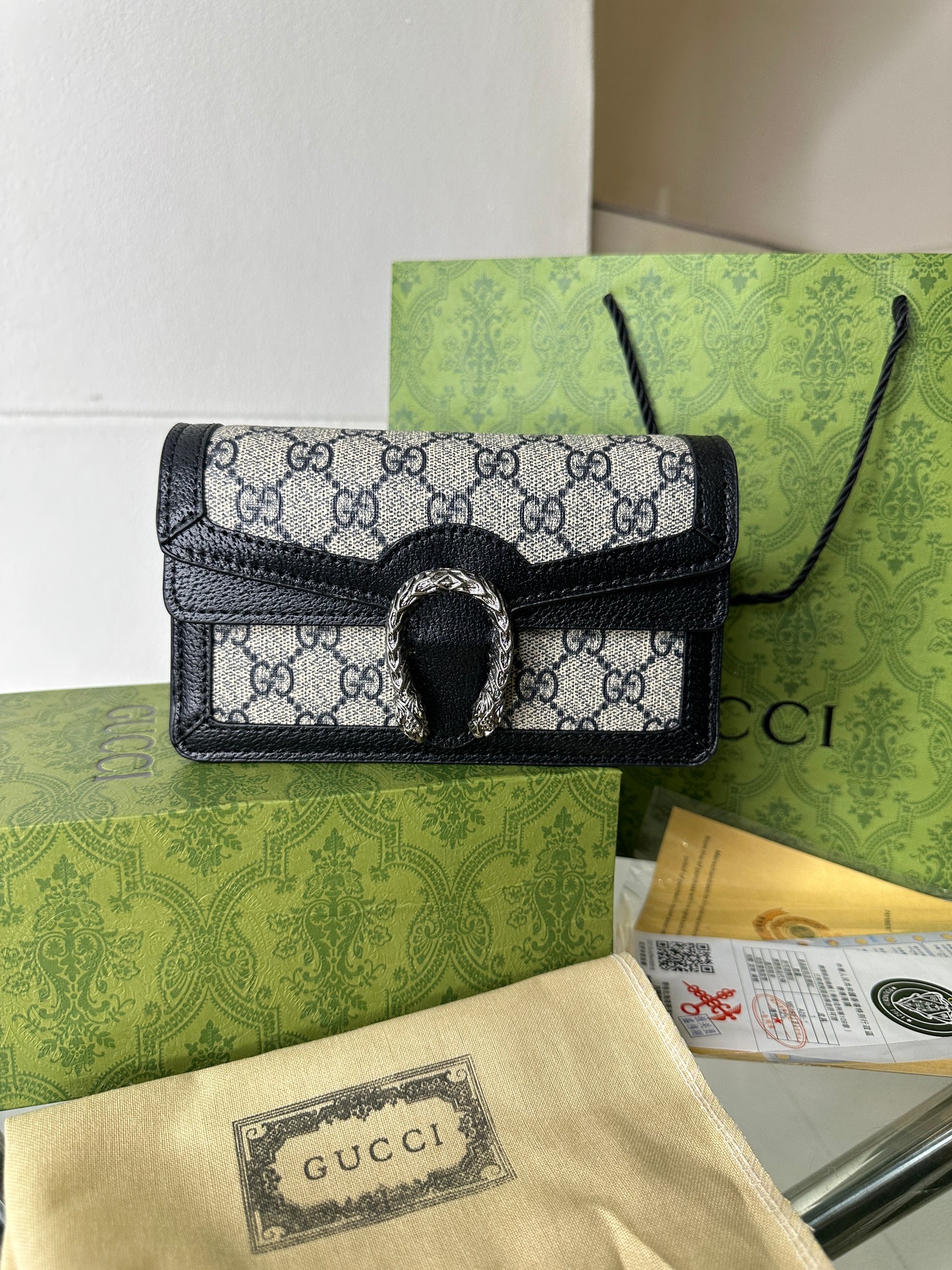 Noir Monogram Clasp Mini Bag