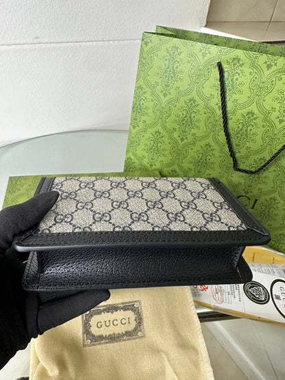 Noir Monogram Clasp Mini Bag